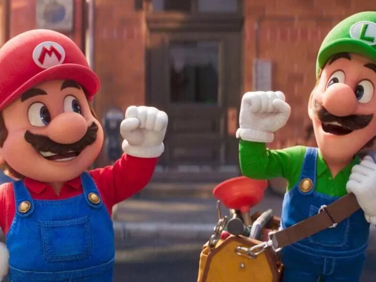 imagem de mario bros e seu irmao luigi levantando os bracos um para o outro como se comemorando algo